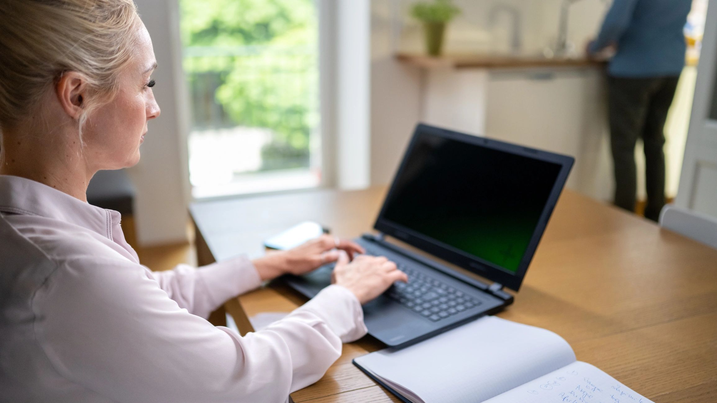 Woman studying online with a laptop