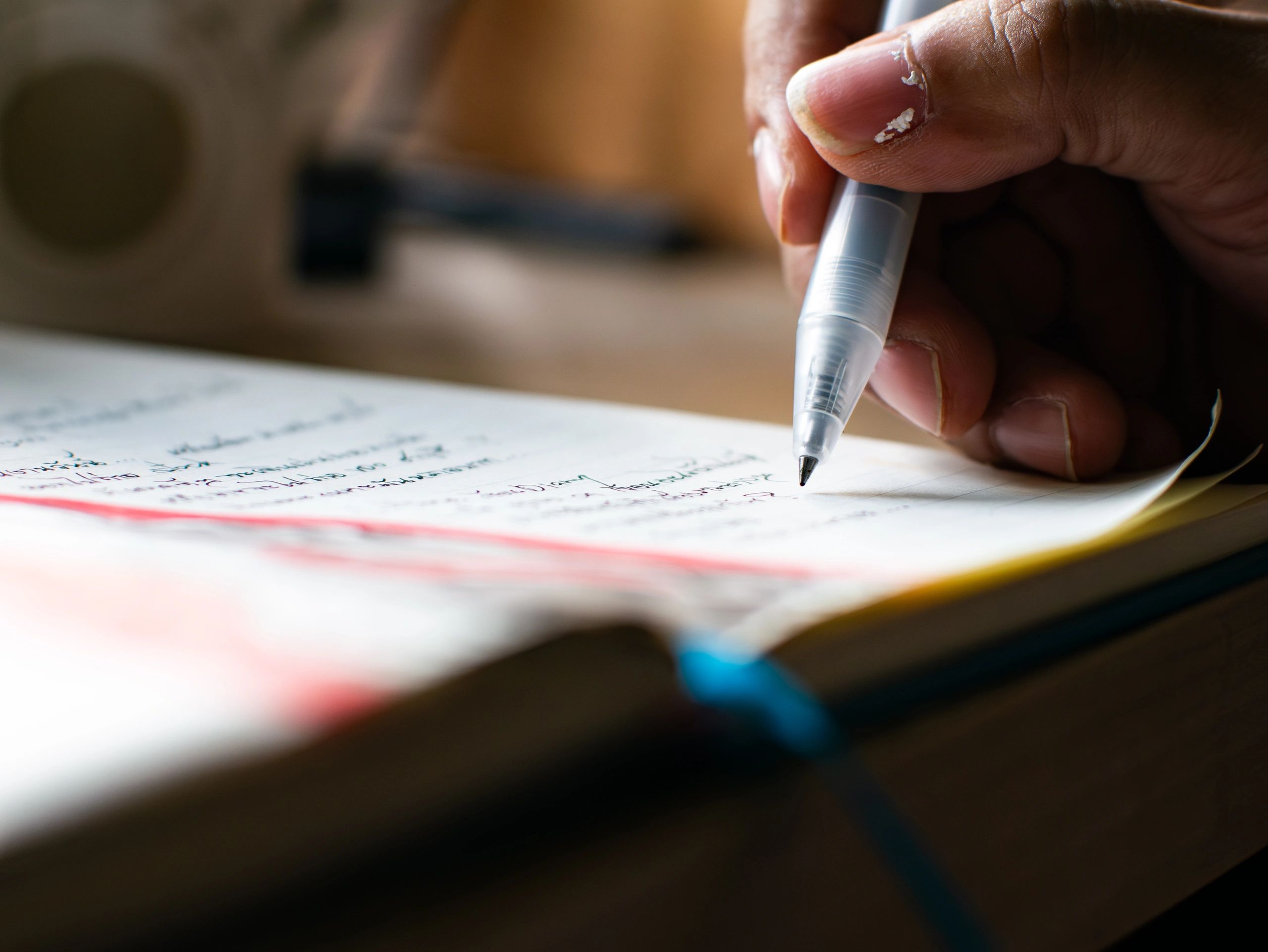 Handwriting notes in a study notebook